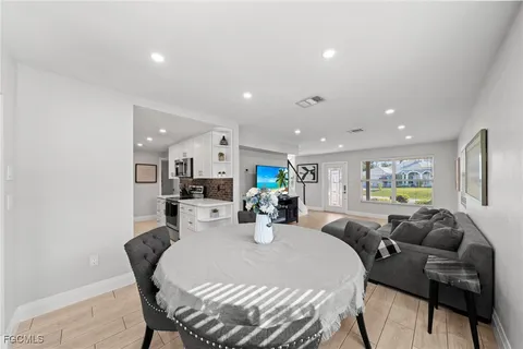 a view of a dining room with furniture