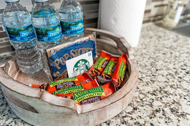 a room with lots of storage and a mirror