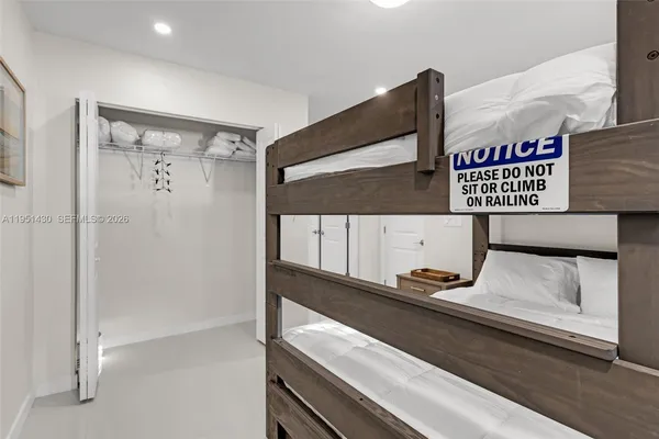 a bathroom with a sink a mirror and vanity