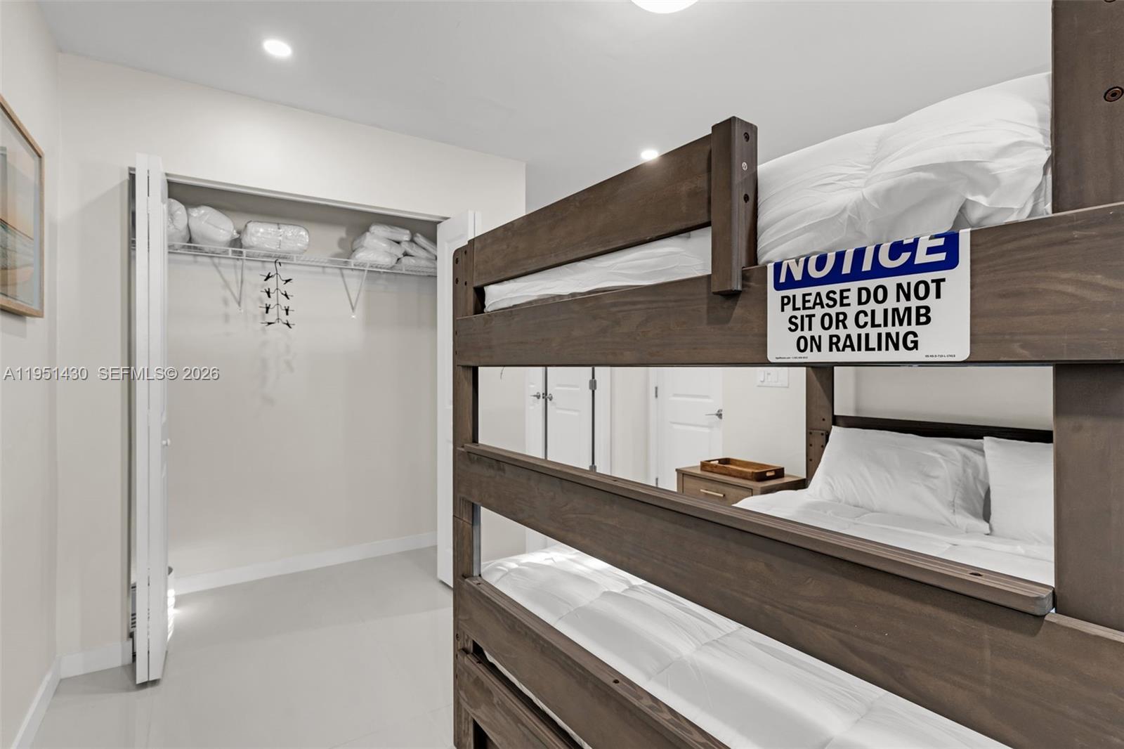 1075 Northeast 12th Avenue, Unit 1075 Homestead, FL 33033 - Photo 25 of 49 a picture of a hallway