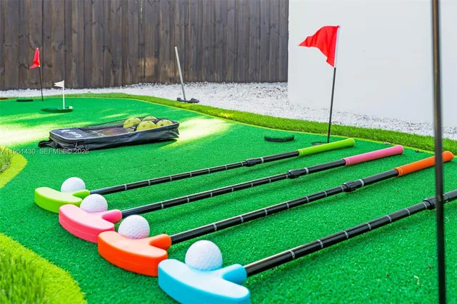 an aerial view of residential building and lake