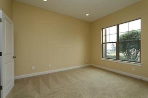 17040 West Fm 1097 Road, Unit 5103 Montgomery, TX 77356 - Photo 9 of 25 an empty room with a window
