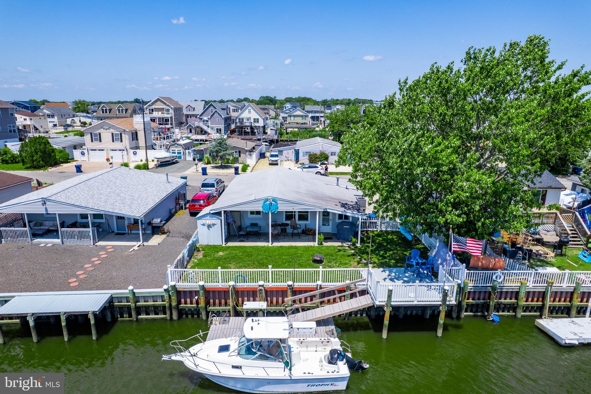 25 West Dory Drive Little Egg Harbor, NJ 08087 - Photo 17 of 56 a aerial view of a house with swimming pool garden and patio