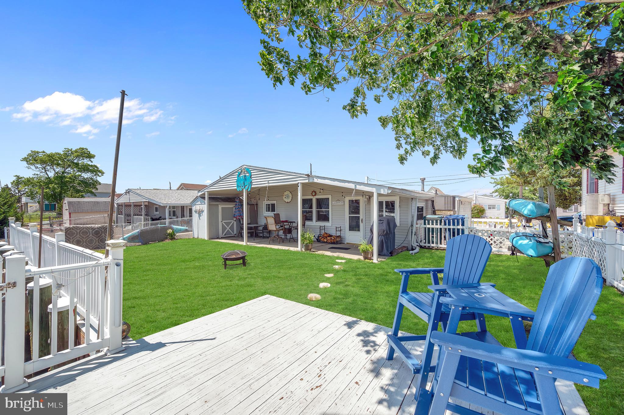 25 West Dory Drive Little Egg Harbor, NJ 08087 - Photo 26 of 56 a view of a house with backyard porch and sitting area