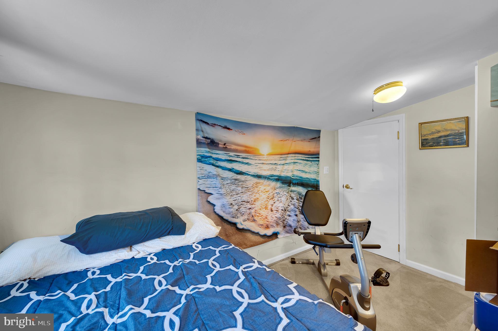 25 West Dory Drive Little Egg Harbor, NJ 08087 - Photo 30 of 56 a living room with a rug and a wooden floor