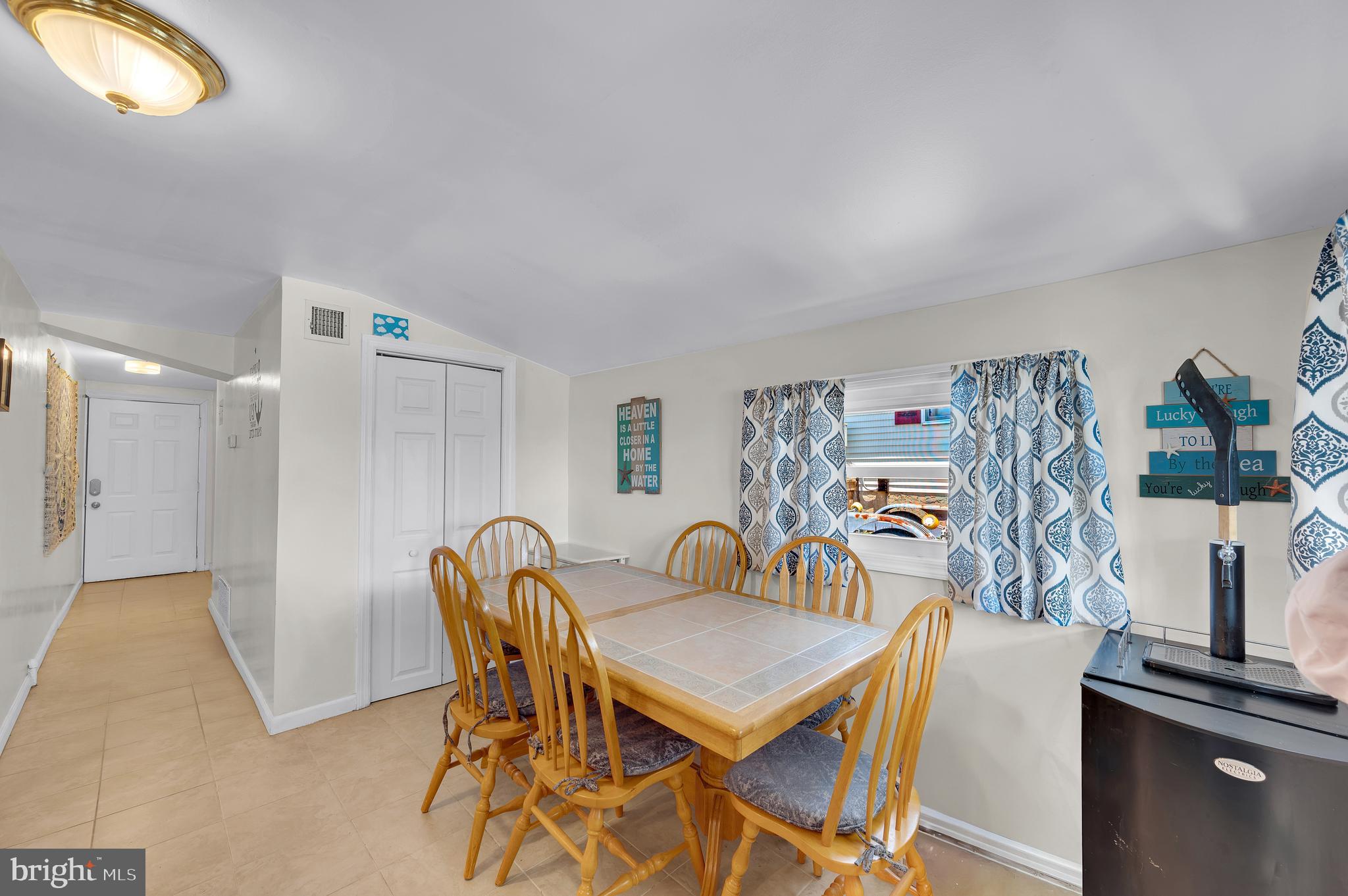 25 West Dory Drive Little Egg Harbor, NJ 08087 - Photo 32 of 56 a dining room with furniture and window