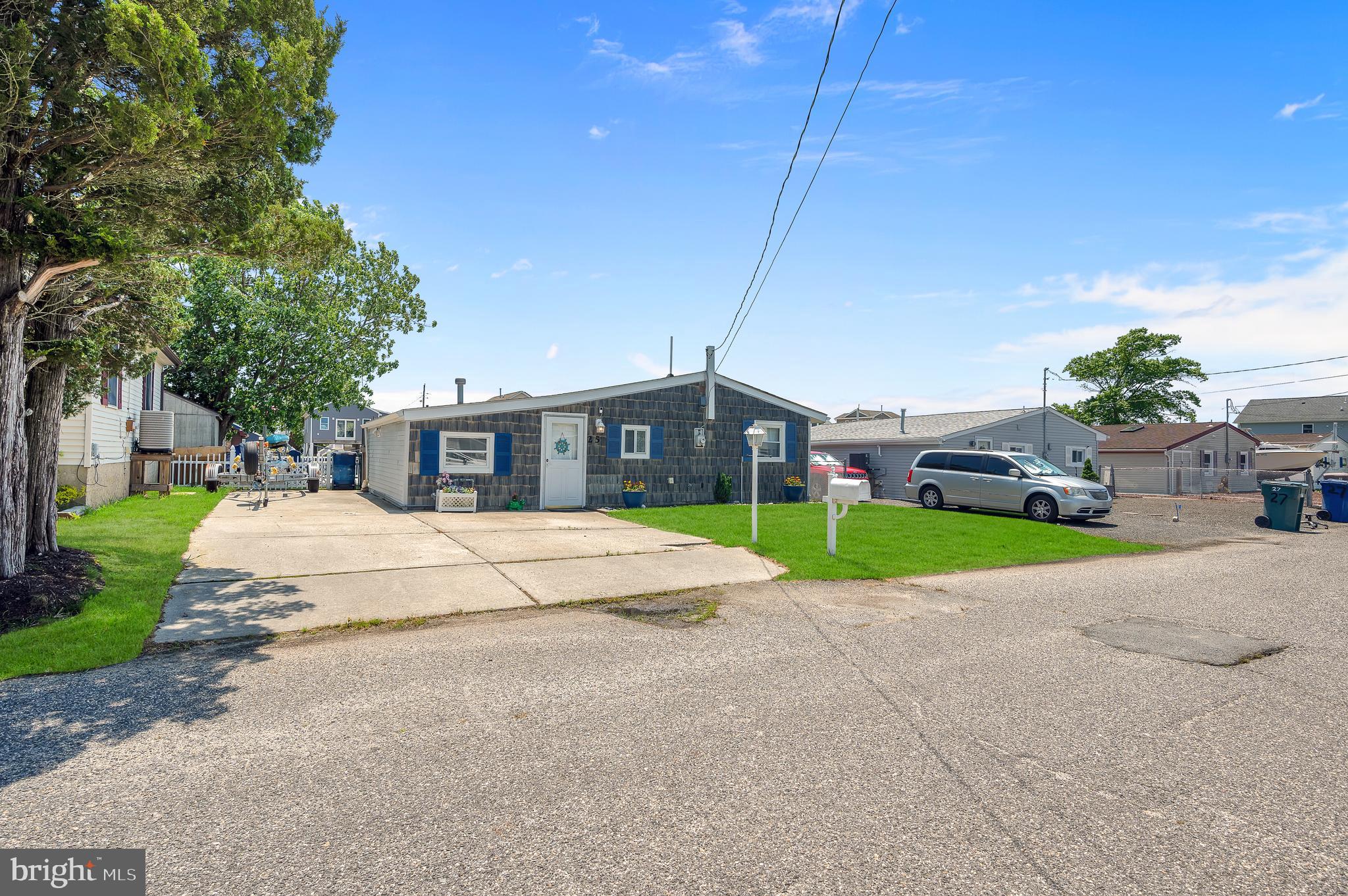 25 West Dory Drive Little Egg Harbor, NJ 08087 - Photo 41 of 56 a house with yard in front of it