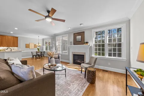 a living room with furniture or fireplace and a wooden floor
