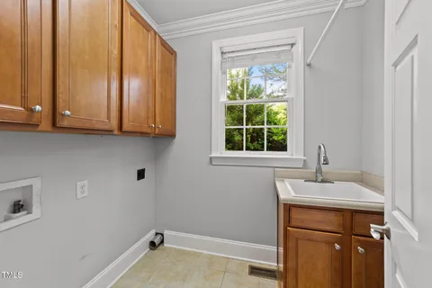 a bathroom with a sink a vanity and a mirror