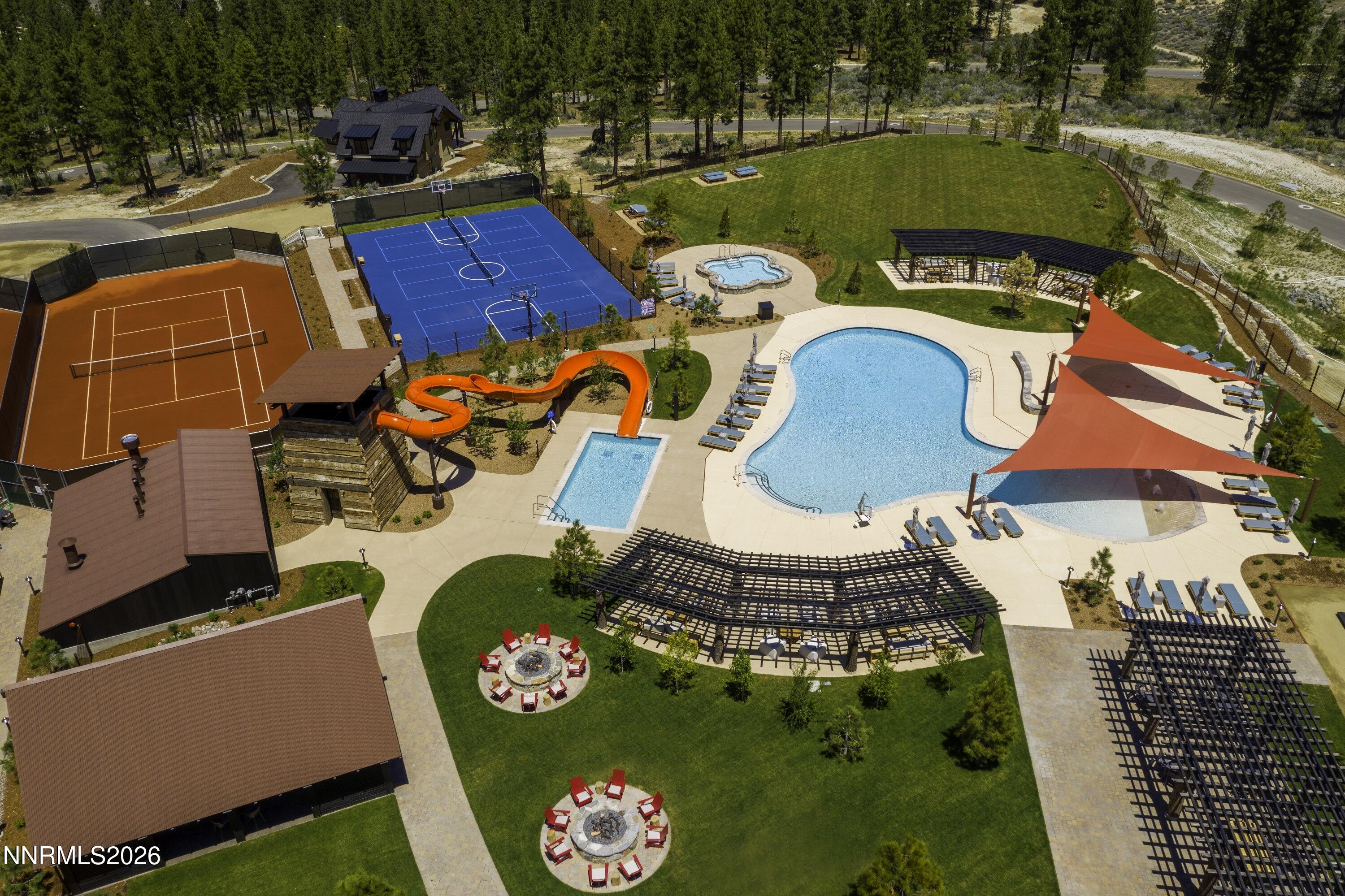 3544 Knob Point Trail Carson City, NV 89705 - Photo 13 of 26 an aerial view of a pool patio chairs and fire pit