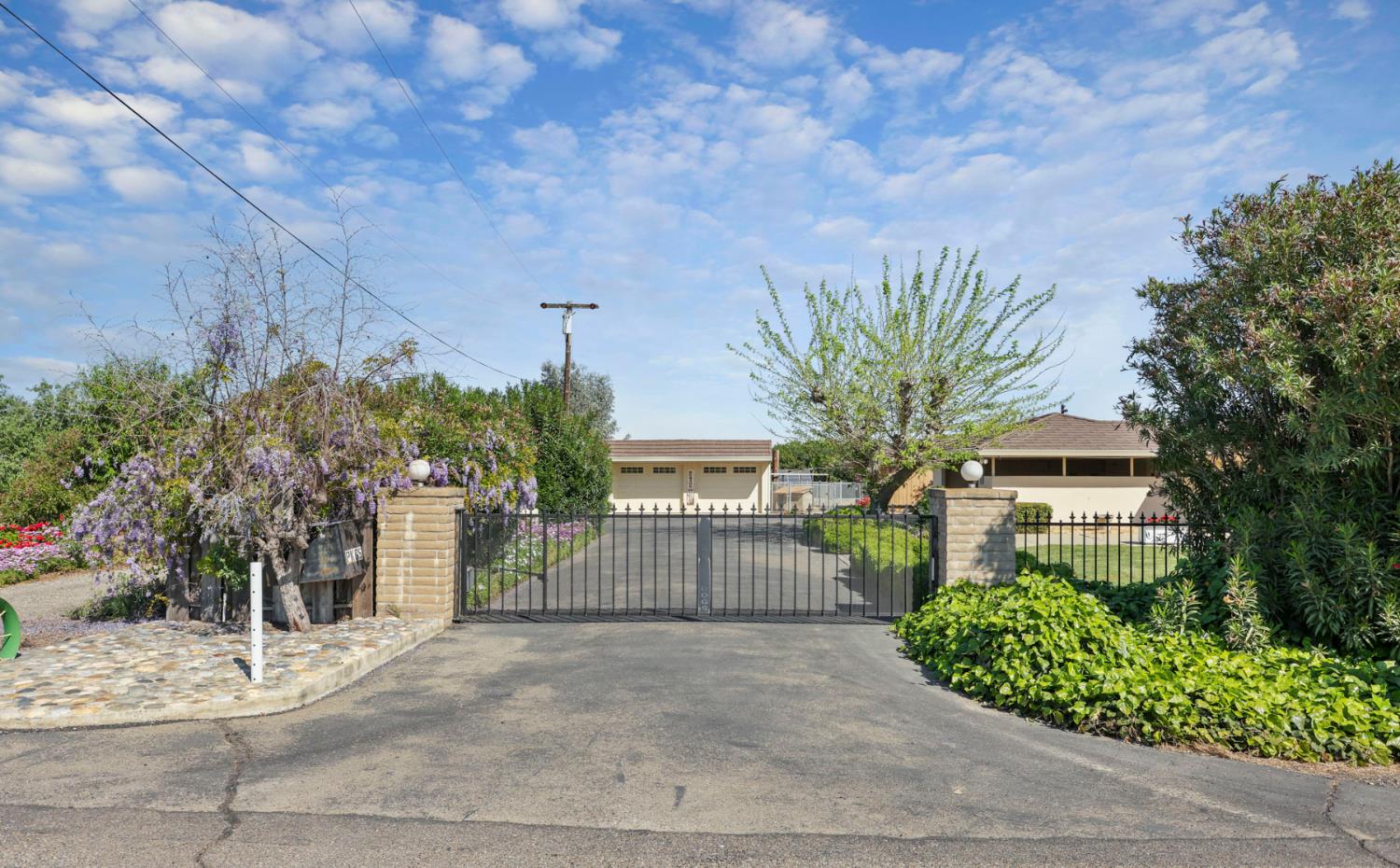 2465 Vernalis Road Tracy, CA 95304 - Photo 51 of 55 a view of a house with a street