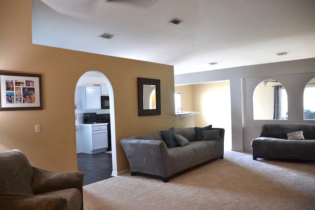 76564 Longleaf Loop Yulee, FL 32097 - Photo 11 of 27 a living room with furniture and a couch
