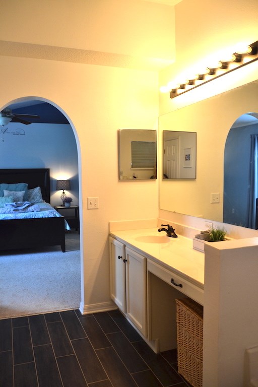 76564 Longleaf Loop Yulee, FL 32097 - Photo 16 of 27 a bathroom with a sink and a mirror