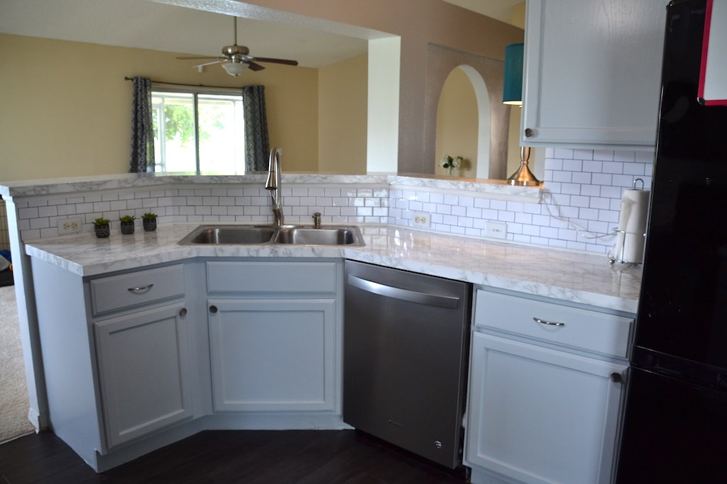 76564 Longleaf Loop Yulee, FL 32097 - Photo 5 of 27 a bathroom with a sink and two mirror