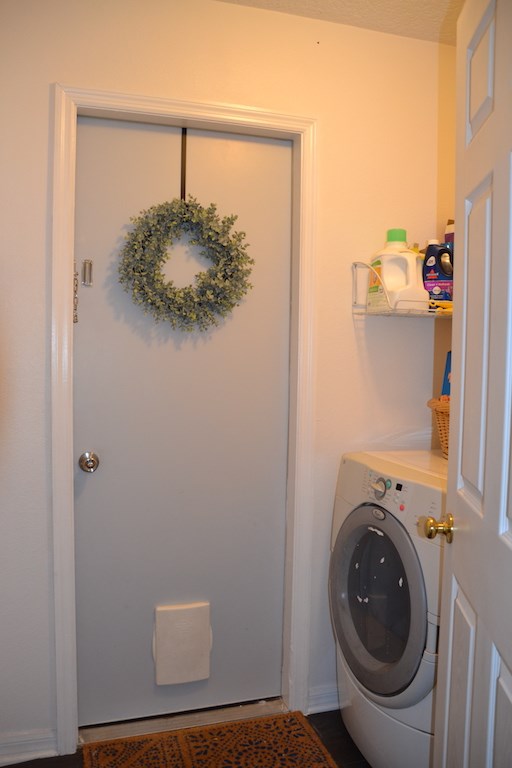 76564 Longleaf Loop Yulee, FL 32097 - Photo 7 of 27 a utility room with dryer and washer