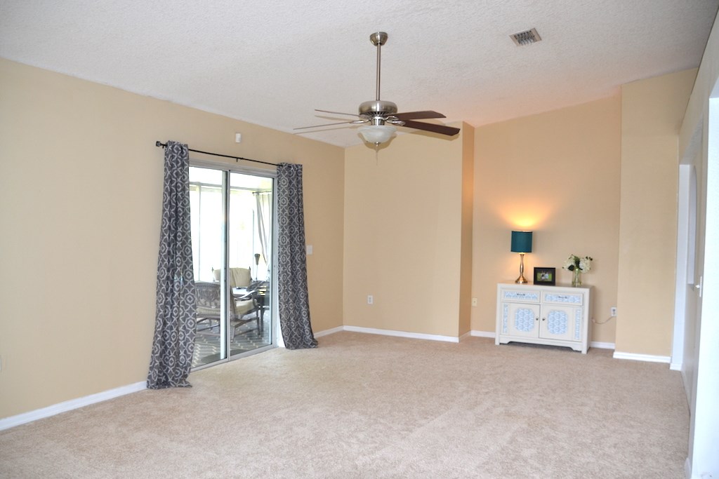 76564 Longleaf Loop Yulee, FL 32097 - Photo 8 of 27 a view of an empty room with a window