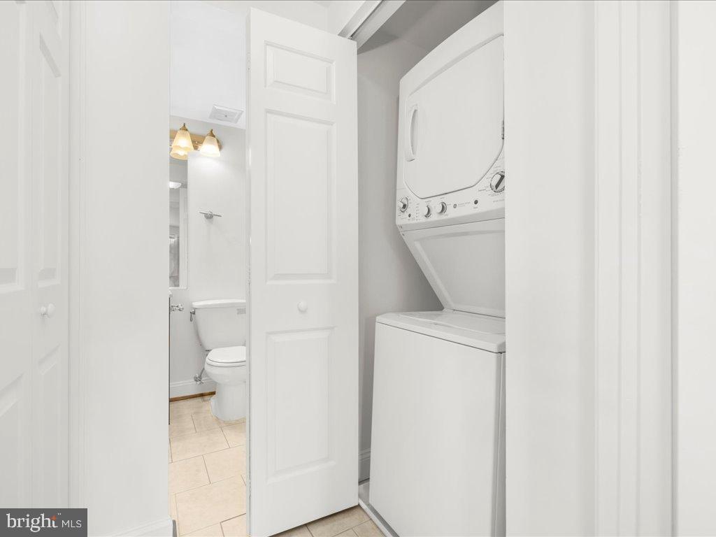 723 South Charles Street, Unit 306 Baltimore, MD 21230 - Photo 20 of 23 a bathroom with a toilet and a shower