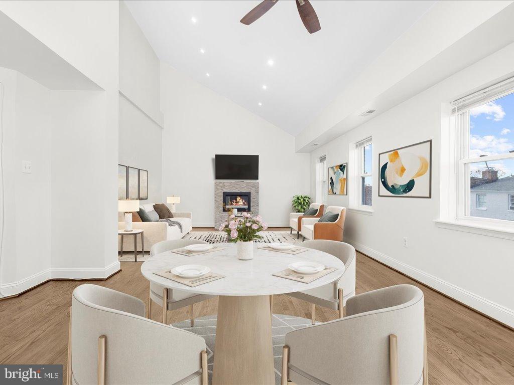 723 South Charles Street, Unit 306 Baltimore, MD 21230 - Photo 4 of 23 a view of a dining room with furniture and wooden floor