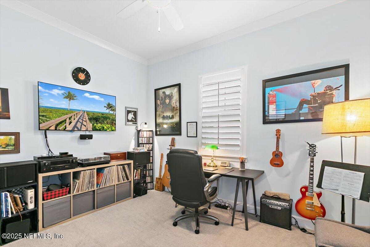 175 Oceanview Drive St. Augustine, FL 32080 - Photo 24 of 56 a view of a workspace with furniture and a window