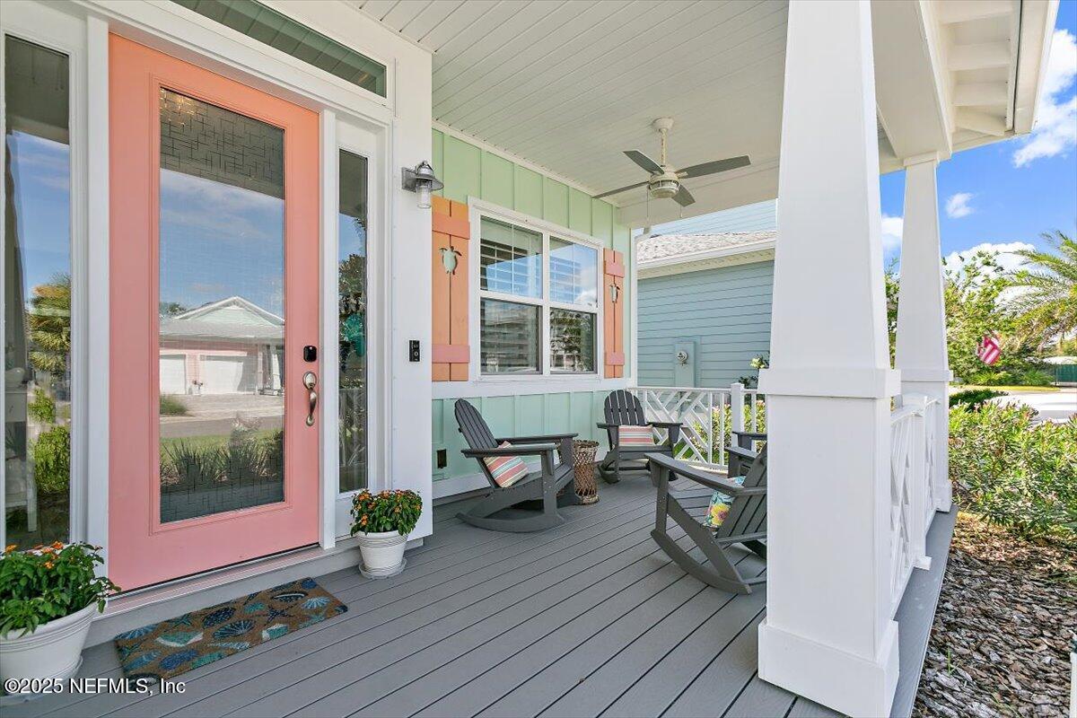 175 Oceanview Drive St. Augustine, FL 32080 - Photo 3 of 56 a view of balcony with two chairs and a potted plant