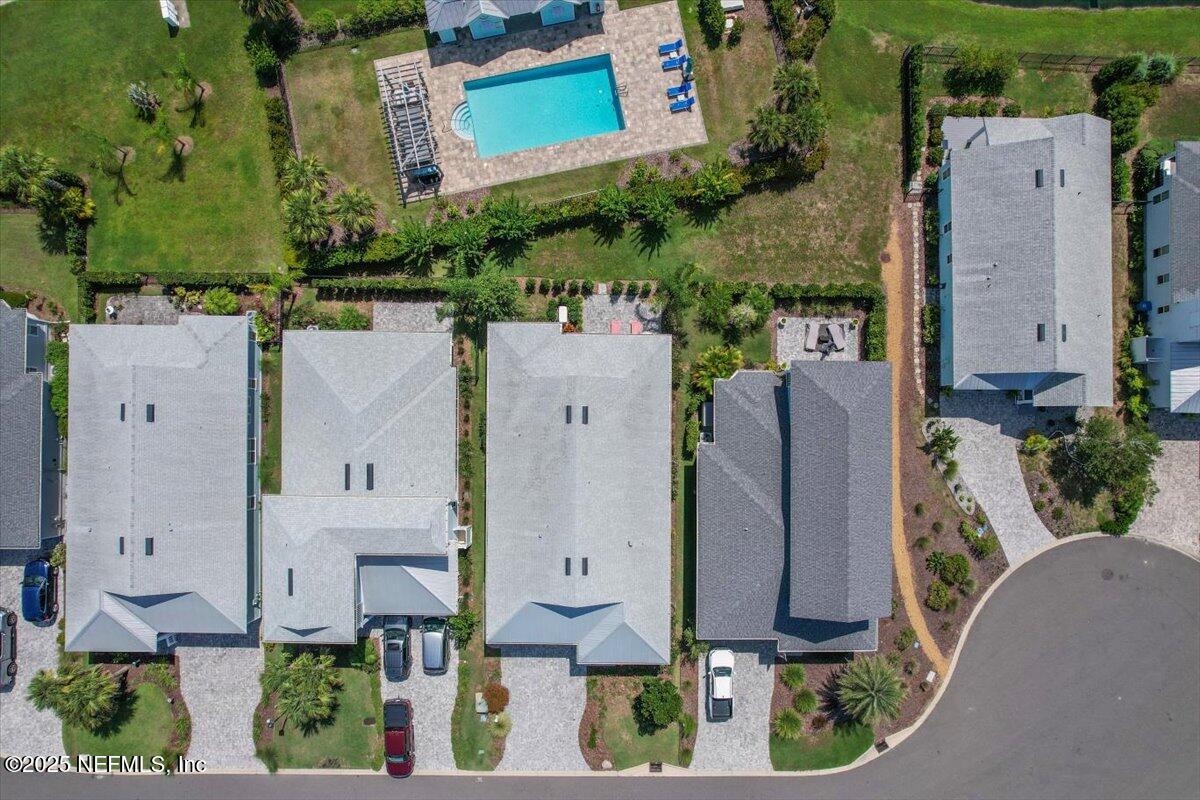 175 Oceanview Drive St. Augustine, FL 32080 - Photo 36 of 56 an aerial view of a house with a yard and large tree
