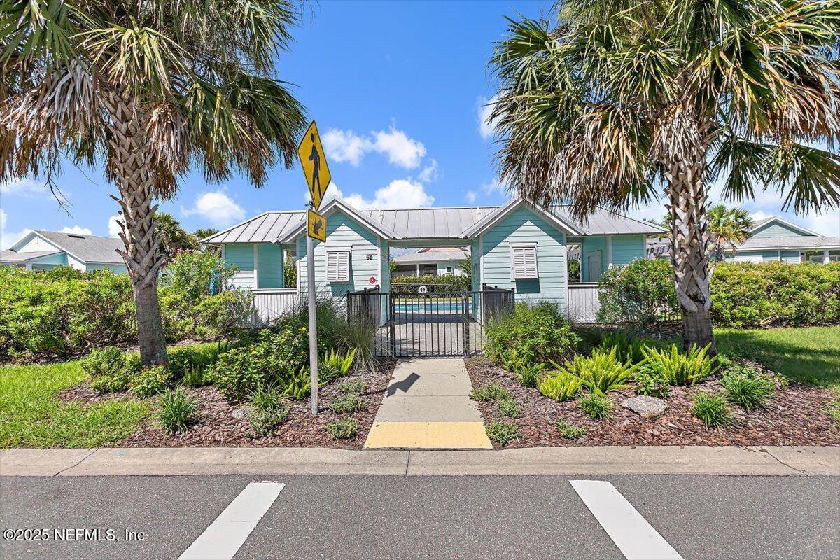 175 Oceanview Drive St. Augustine, FL 32080 - Photo 46 of 56 a front view of house with yard and green space