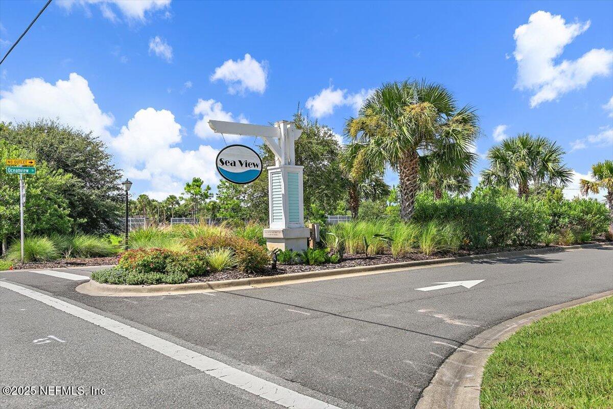 175 Oceanview Drive St. Augustine, FL 32080 - Photo 47 of 56 a front view of a house with a yard and a trees