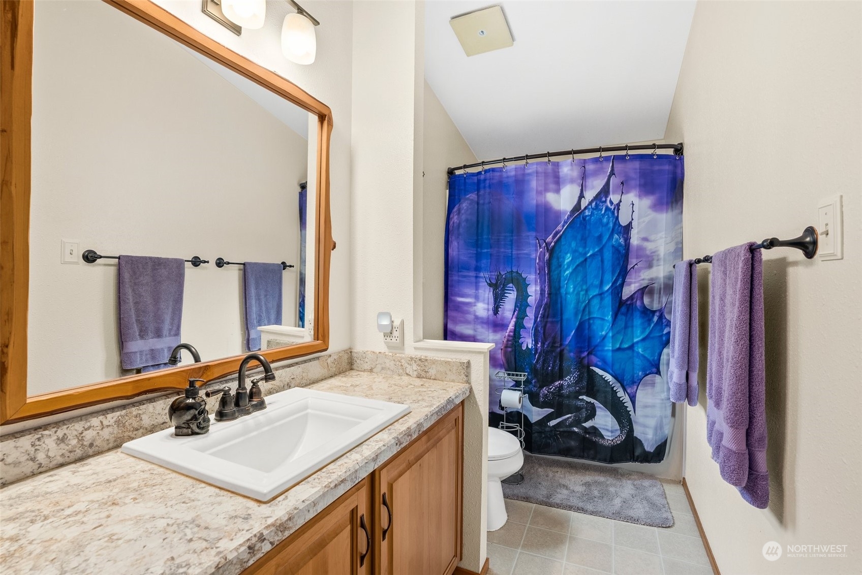 13434 Marcon Lane Southwest Rochester, WA 98579 - Photo 18 of 38 a bathroom with a sink double vanity