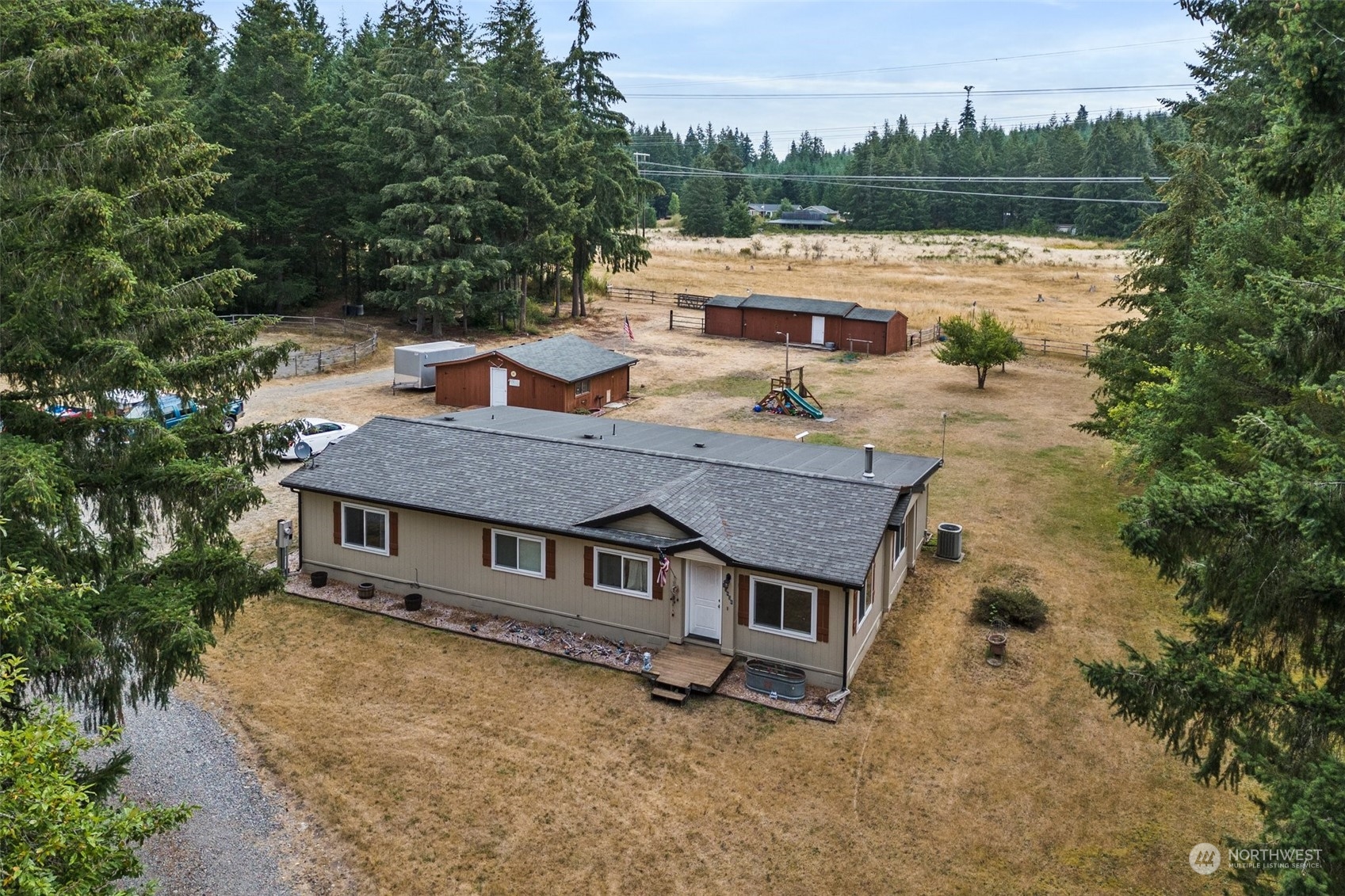 13434 Marcon Lane Southwest Rochester, WA 98579 - Photo 2 of 38 an aerial view of a house with lake view and boat