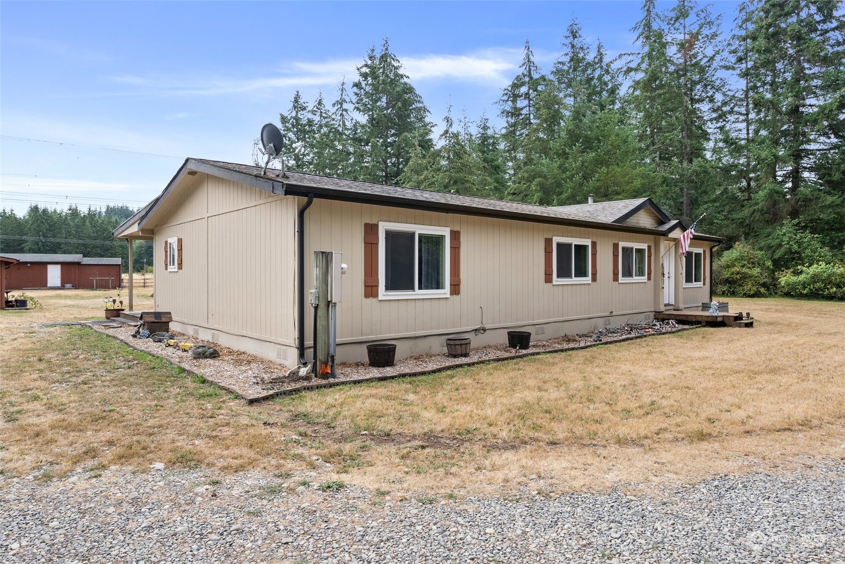 13434 Marcon Lane Southwest Rochester, WA 98579 - Photo 3 of 38 a view of a house with a yard