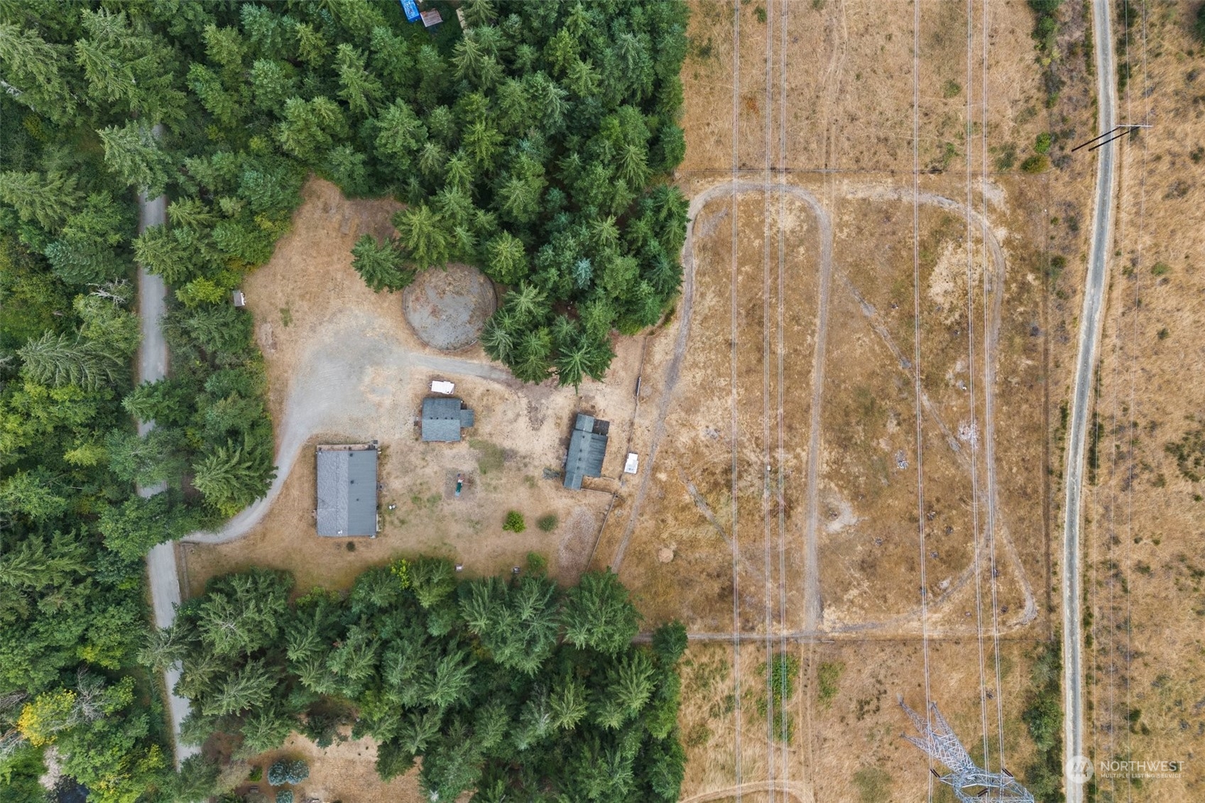 13434 Marcon Lane Southwest Rochester, WA 98579 - Photo 33 of 38 an aerial view of a house with yard