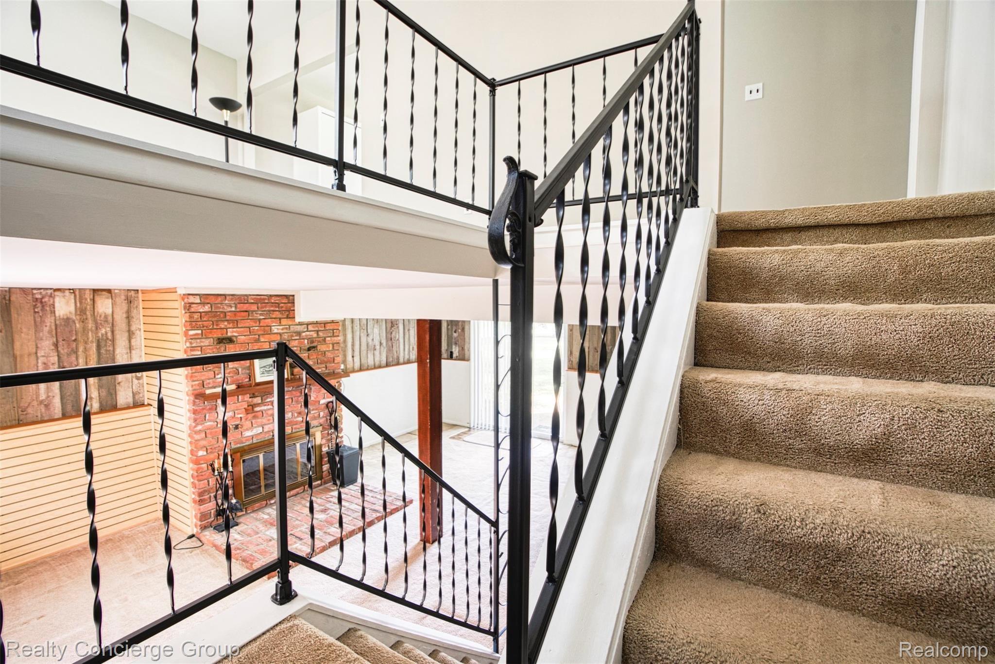 6505 Byron Road Howell, MI 48855 - Photo 6 of 20 Head upstairs or downstairs to enjoy the space of this home.