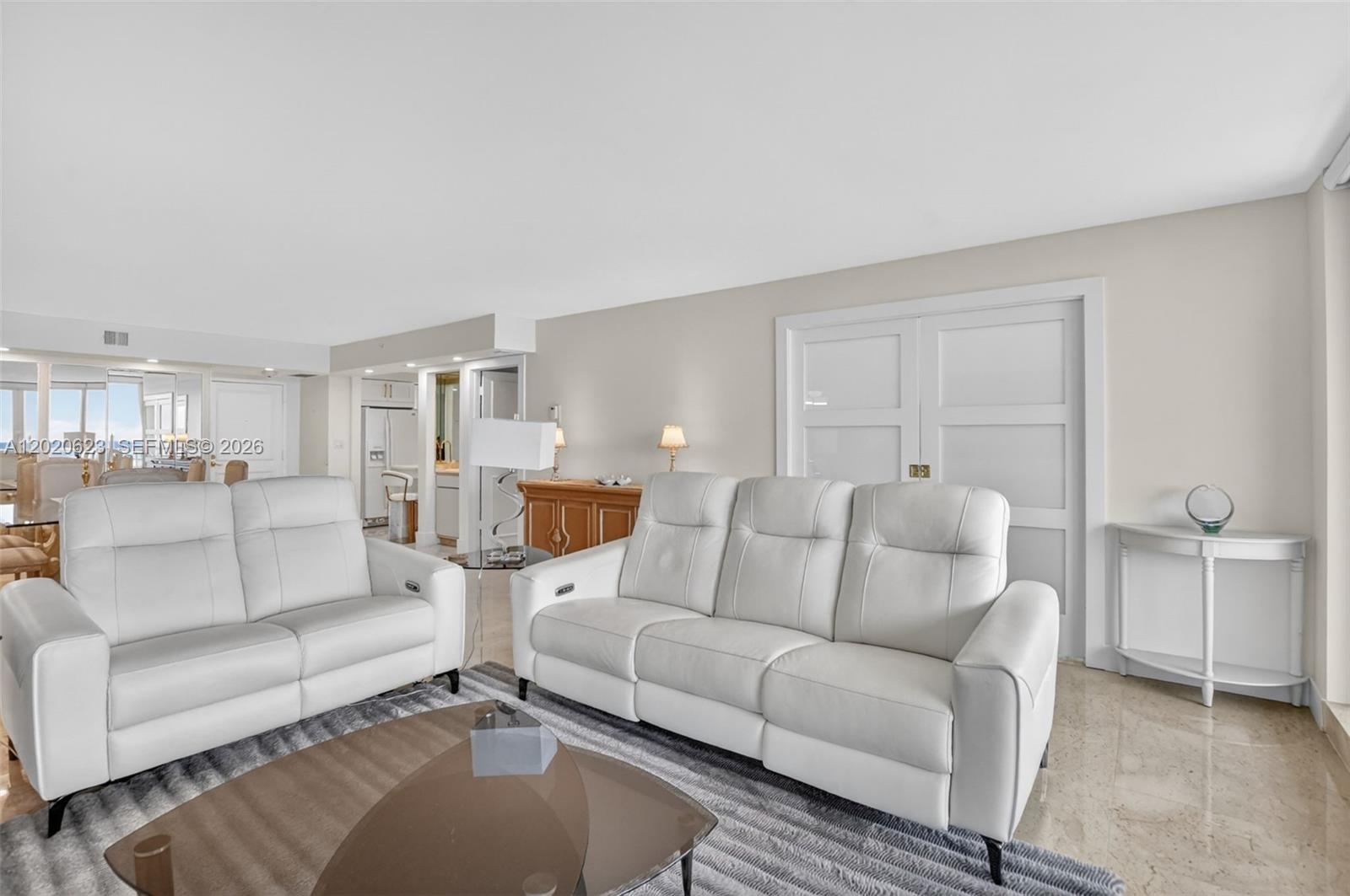 4101 North Ocean Boulevard, Unit 1605 Boca Raton, FL 33431 - Photo 14 of 35 a living room with furniture and a couch