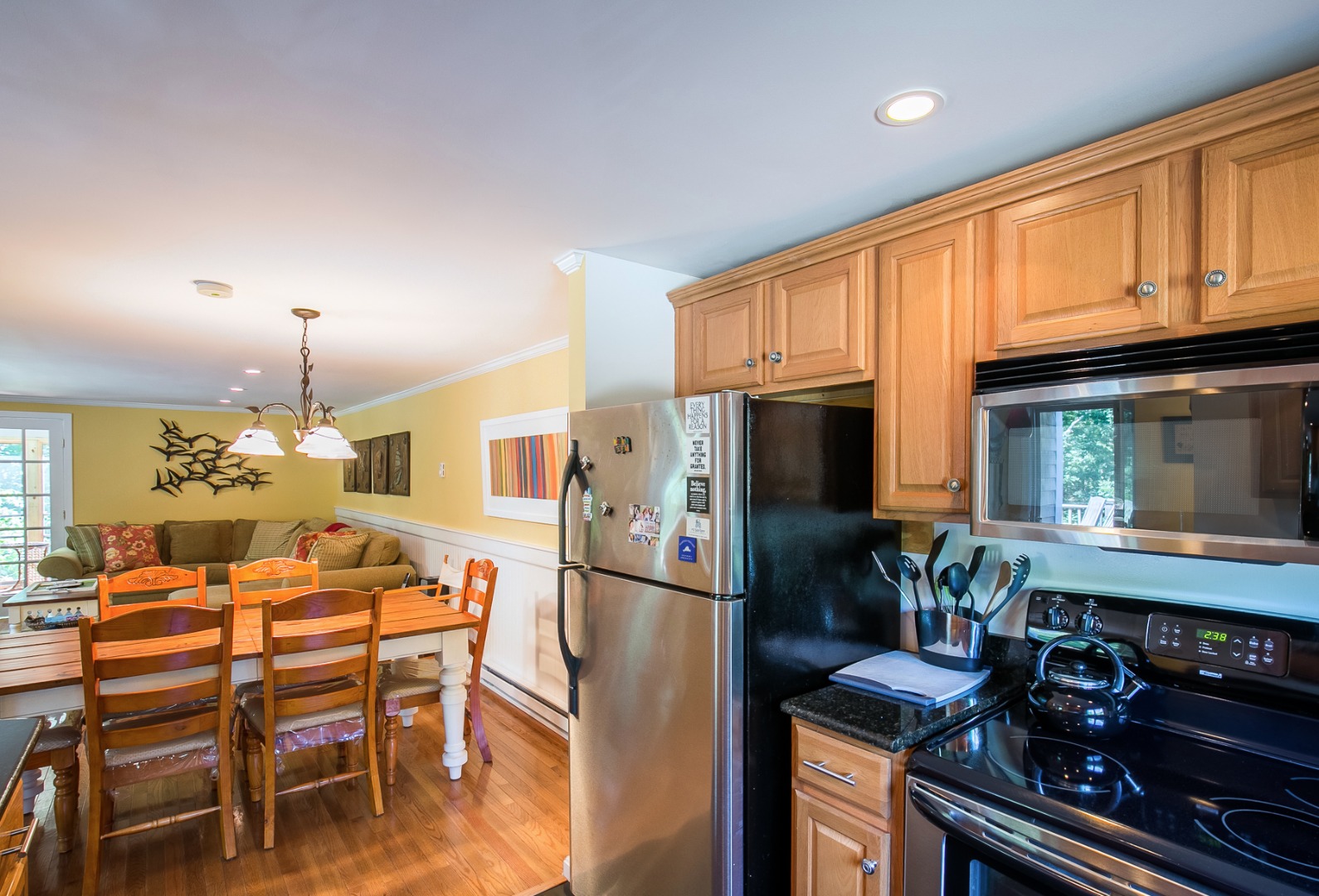 2 Mattakesett Bay Road, Unit M2 Edgartown, MA 02539 - Photo 9 of 22 Open plan concept - kitchen, dining, living room, and screened porch beyond