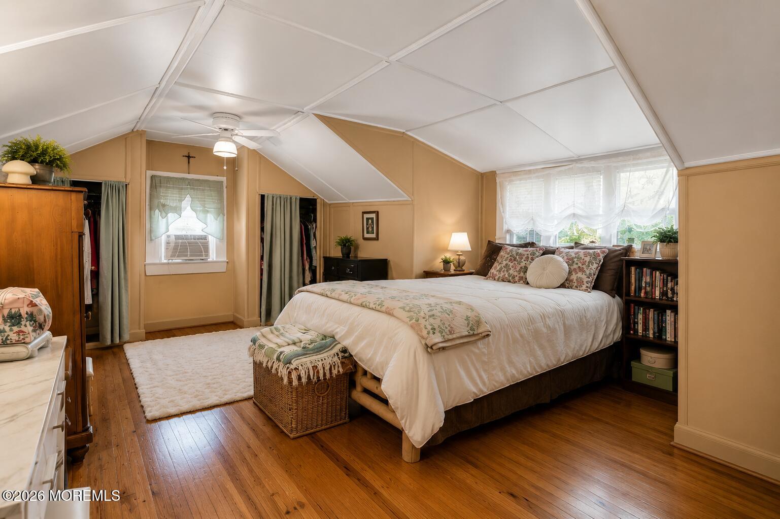 24 Foster Street Middletown, NJ 07701 - Photo 11 of 23 a bedroom with a bed and wooden floor