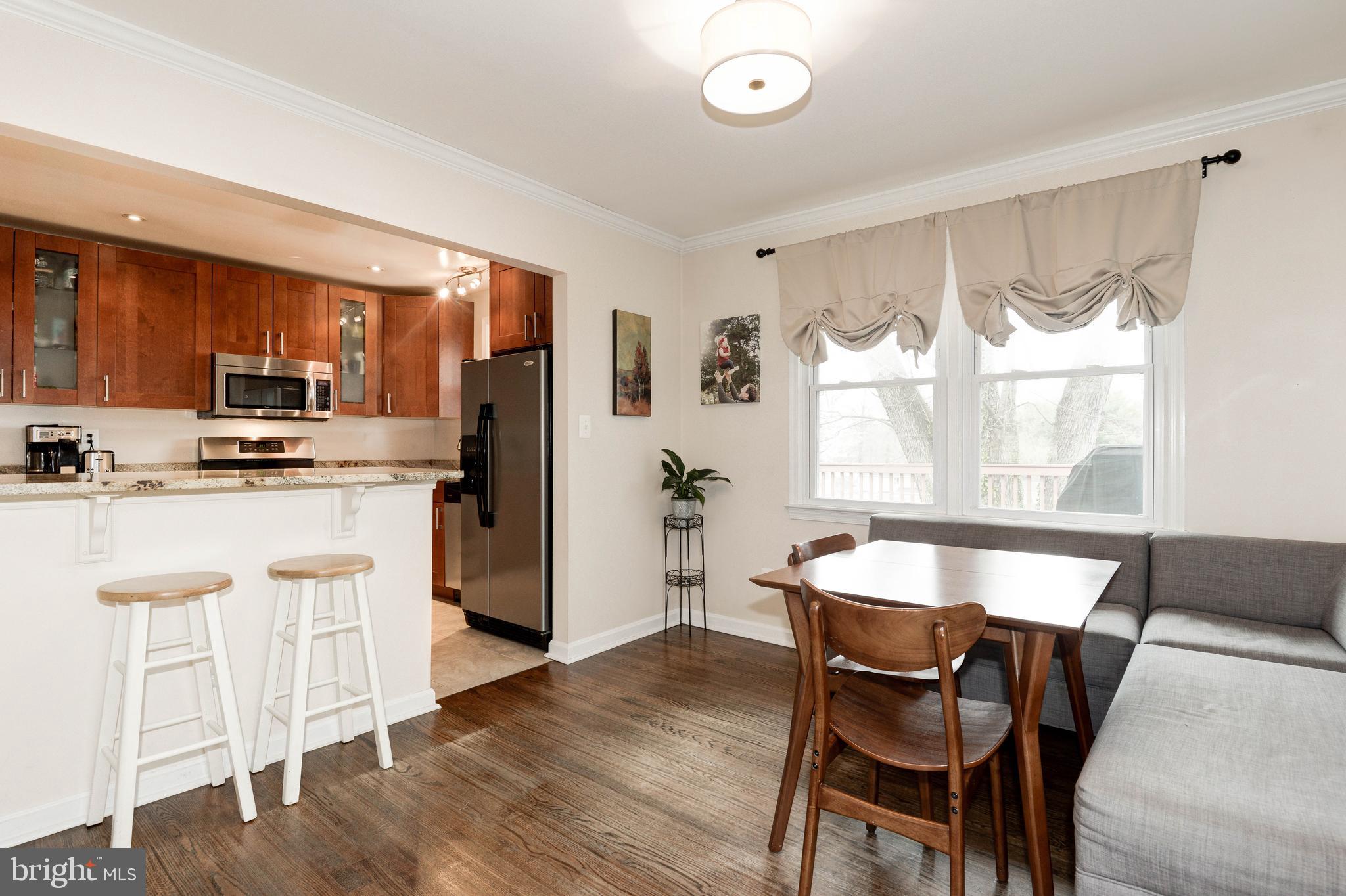 7505 Long Pine Drive Springfield, VA 22151 - Photo 24 of 63 DINING AREA AND BREAKFAST COUNTER