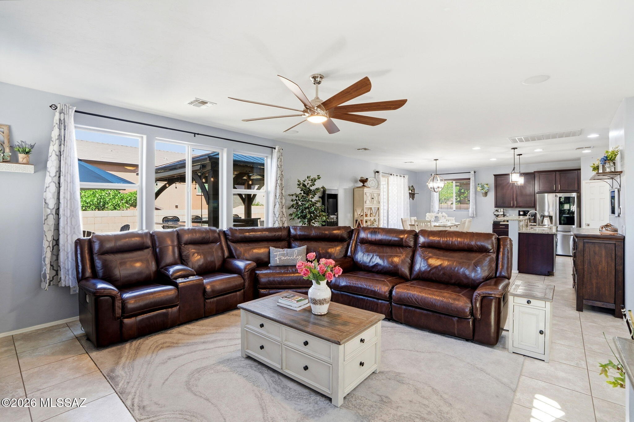 211 East Refuge Loop Vail, AZ 85641 - Photo 6 of 48 a living room with furniture and a large window