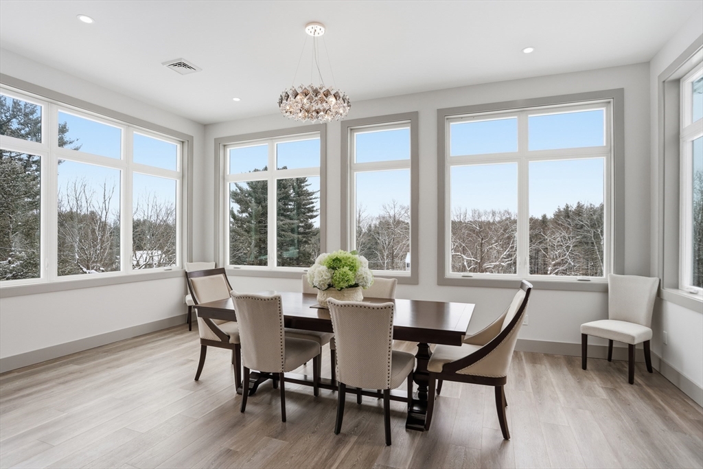 235 Kemp Street Dunstable, MA 01827 - Photo 11 of 42 a view of a dining room with furniture window and outside view