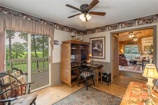a view of a livingroom with furniture window and outside view