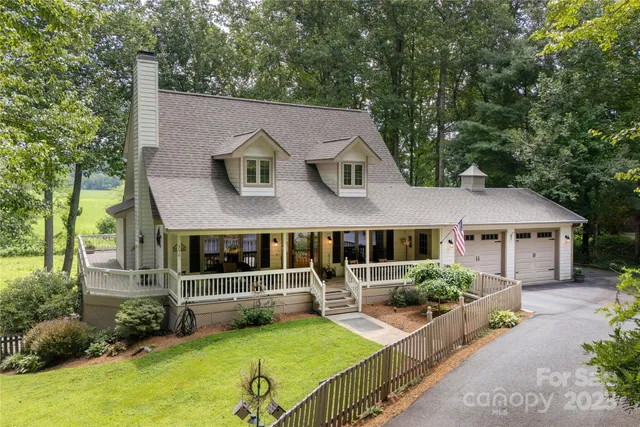 an aerial view of a house with roof yard