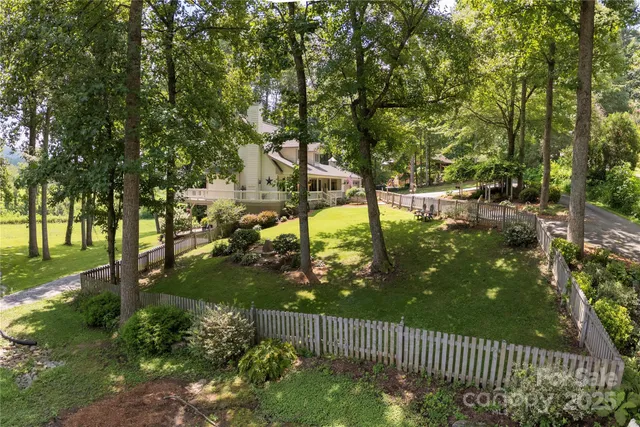a view of swimming pool from a garden