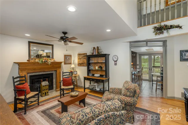 a living room with furniture or couch and a fireplace