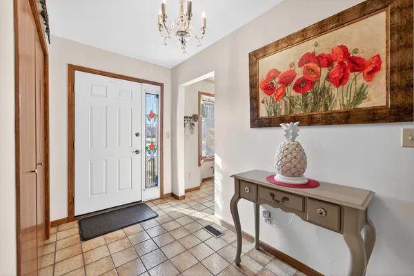 a view of room with furniture and wooden floor