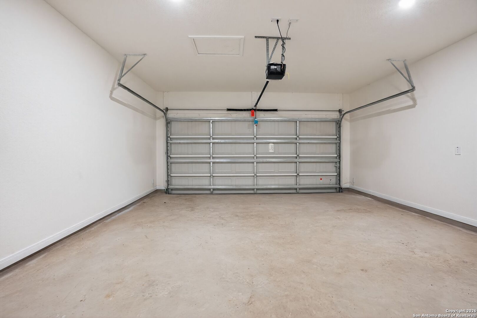 5402 Devils Gate, Unit 1 Converse, TX 78109 - Photo 16 of 20 a view of a garage