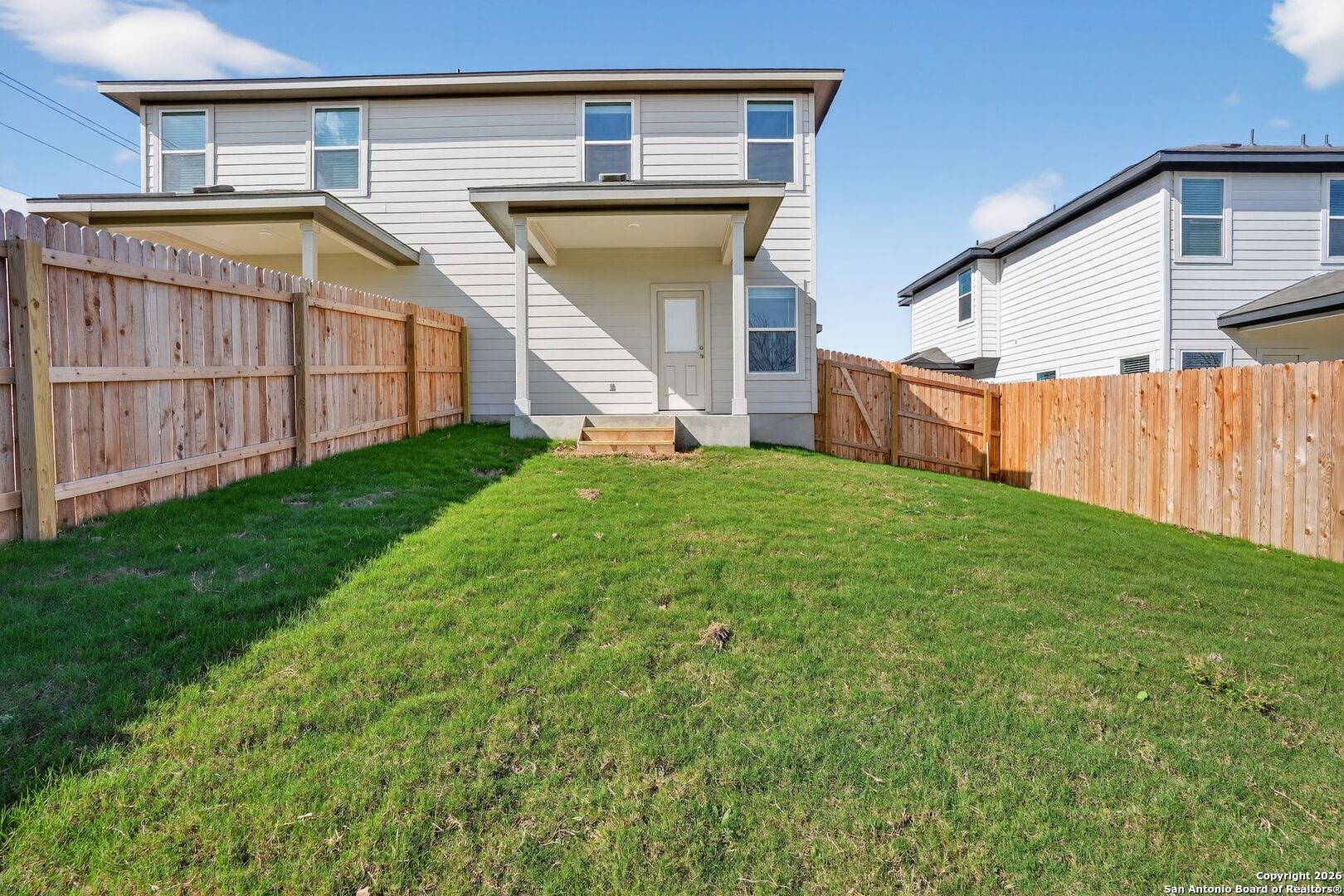 5402 Devils Gate, Unit 1 Converse, TX 78109 - Photo 19 of 20 a view of a house with a yard