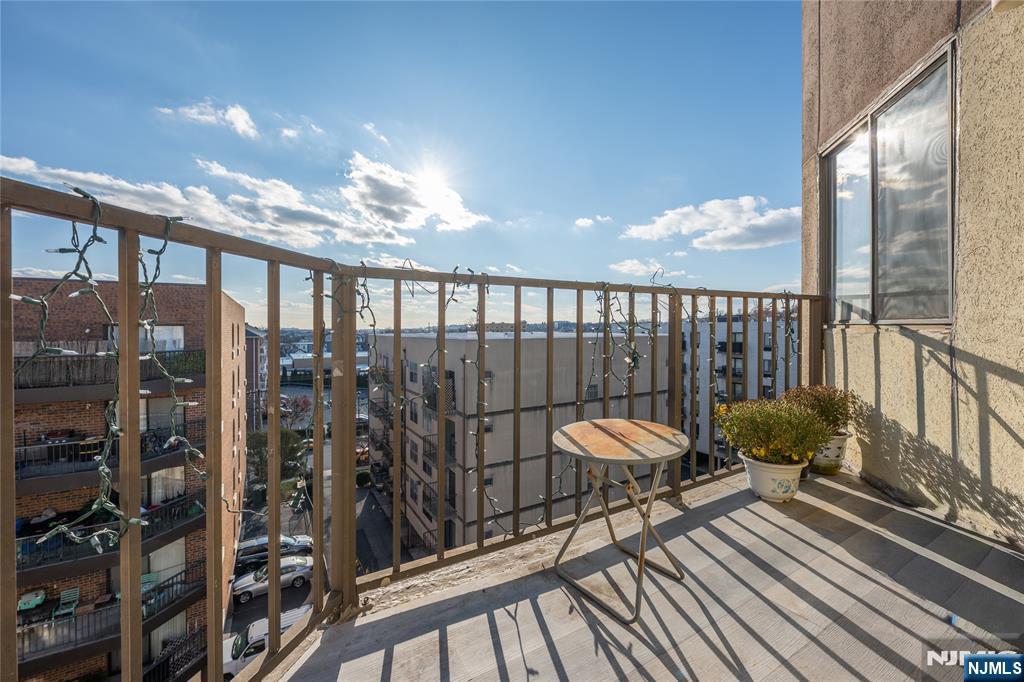 75 Union Street, Unit 5E Hackensack, NJ 07601 - Photo 16 of 24 a balcony with chairs
