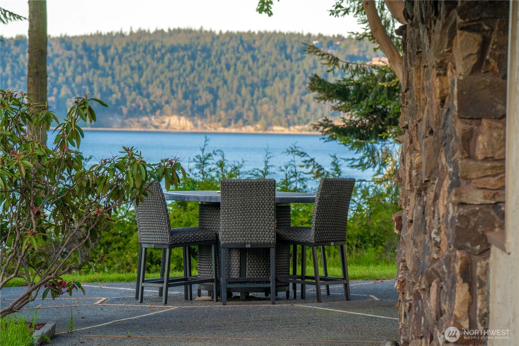 491 Bachelor Road Sequim, WA 98382 - Photo 32 of 39 a view of a chairs and table in the roadside
