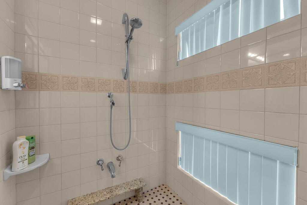 12622 Miracle Hill Road Desert Hot Springs, CA 92240 - Photo 36 of 124 a bathroom with a shower