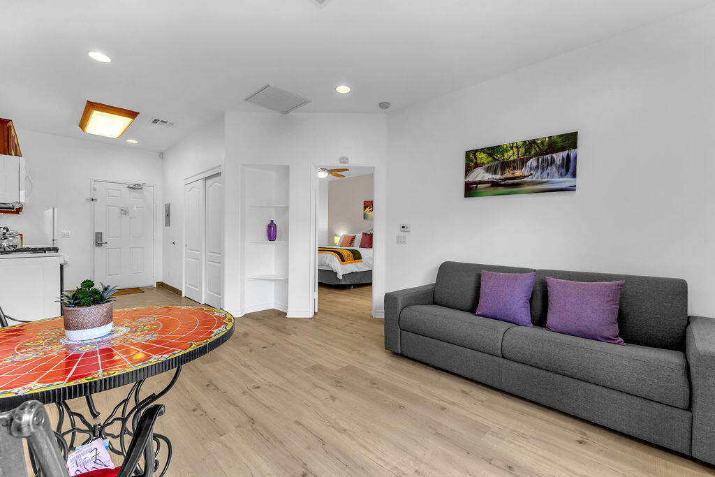 12622 Miracle Hill Road Desert Hot Springs, CA 92240 - Photo 86 of 124 a living room with furniture and a table