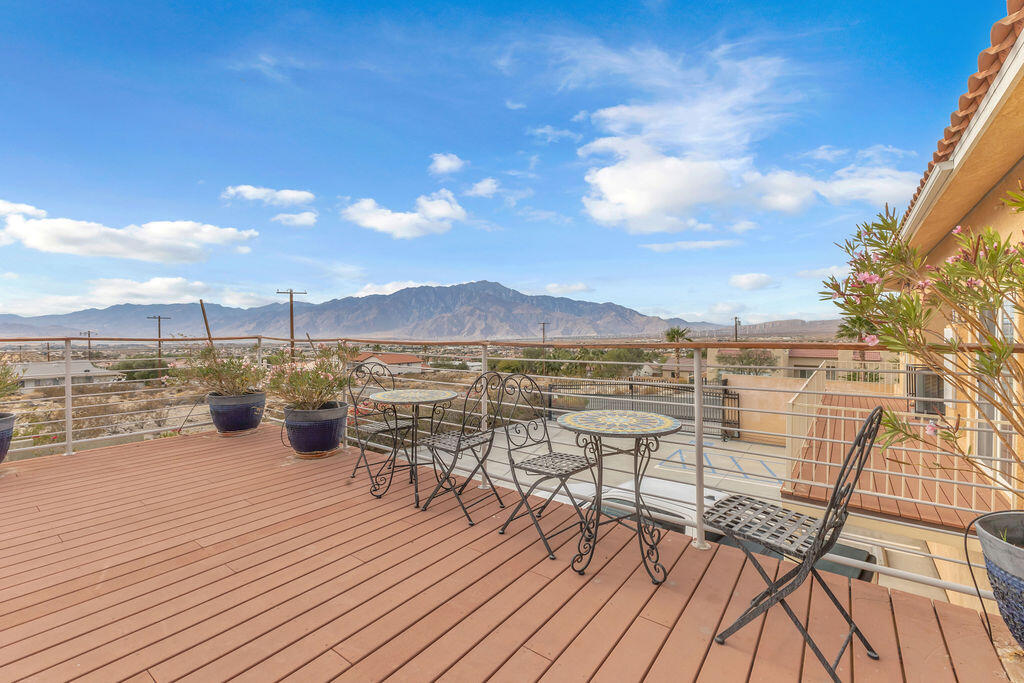 12622 Miracle Hill Road Desert Hot Springs, CA 92240 - Photo 10 of 124 a view of a terrace with seating space
